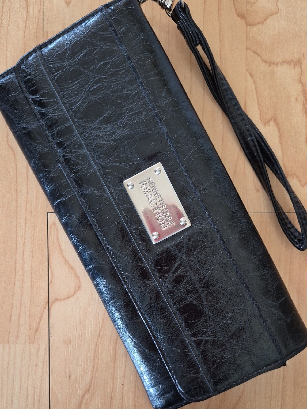 Kenneth Cole Reaction Black Leather-Look Wristlet with Silver Plaque